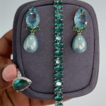 EARING AND MATCHING BRACELET WITH RING